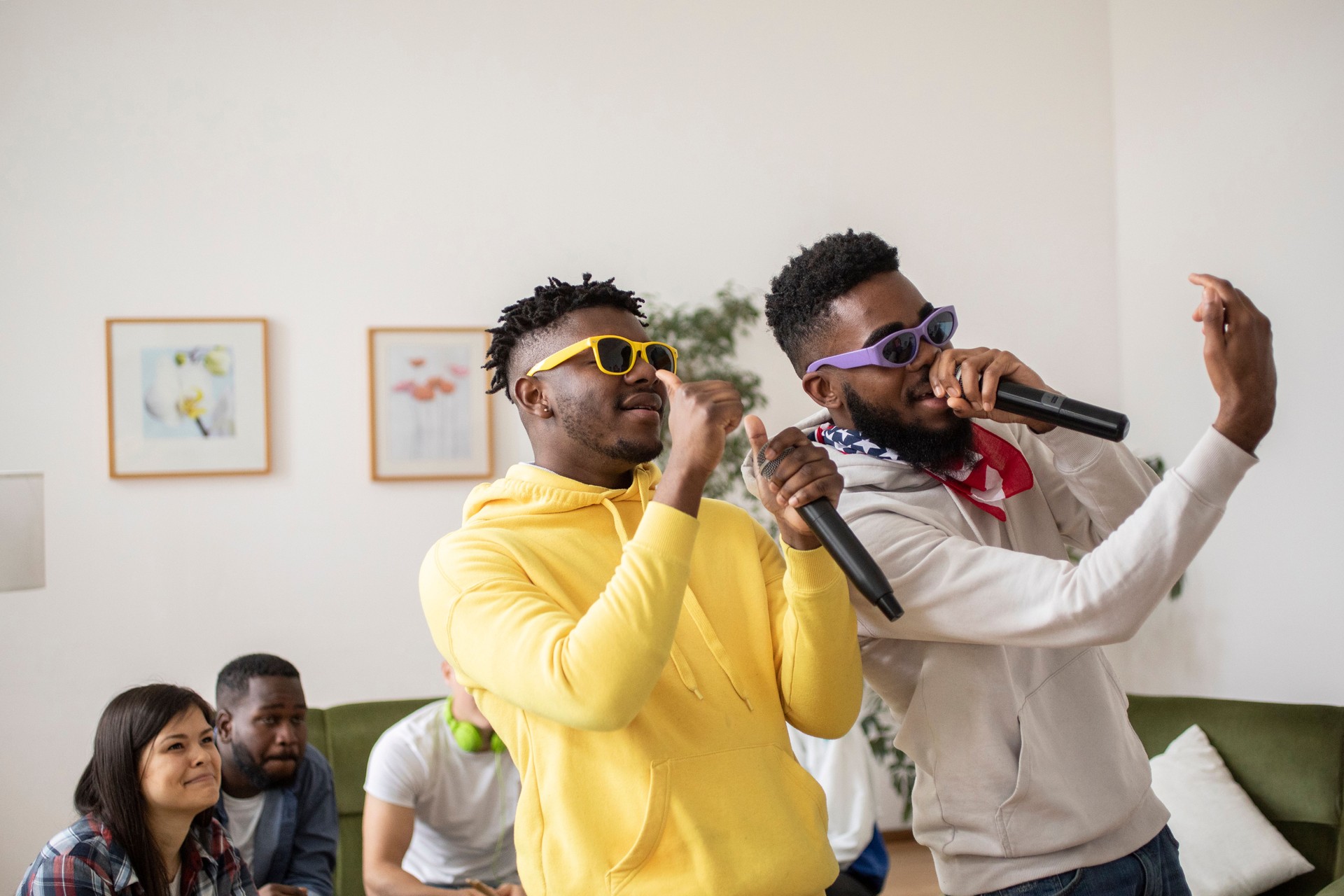 Two friends singing and dancing together